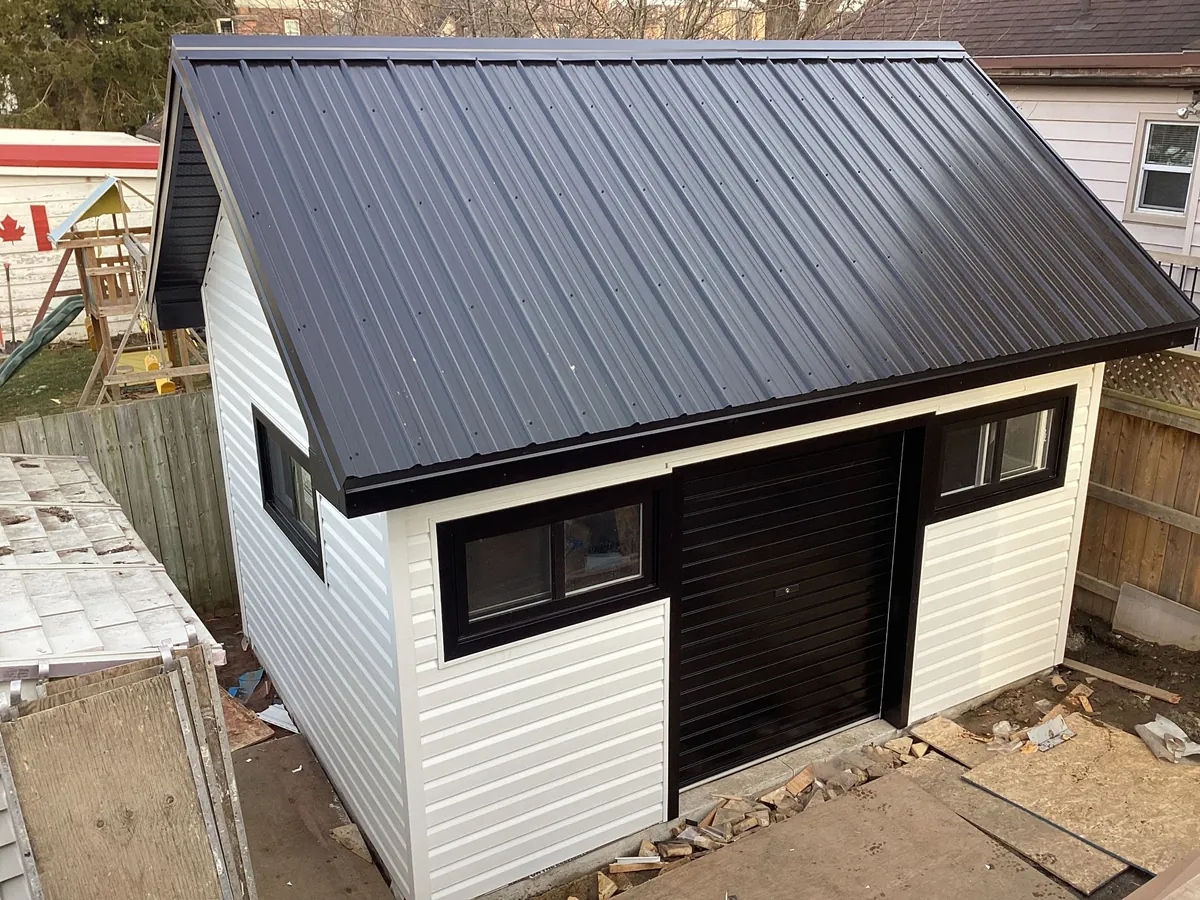 Custom detached garage with metal roof
