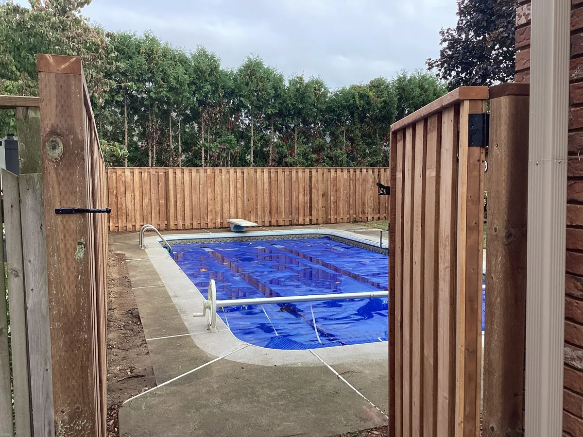 Cedar pool fence and gate enclosure