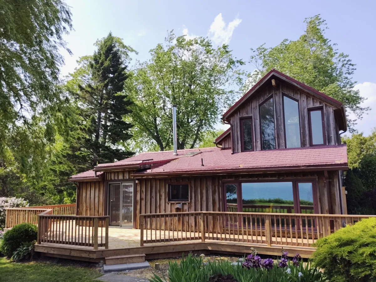 Finished cedar lakefront deck with hot tub surround and lake views